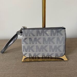 Michael Kors Small Zip Top Wristlet in Metallic Silver Logo